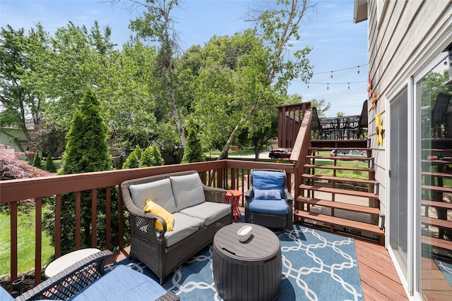 9640 Quail Run, Urbandale, IA 50322 - wooden deck featuring an outdoor living space and stairway