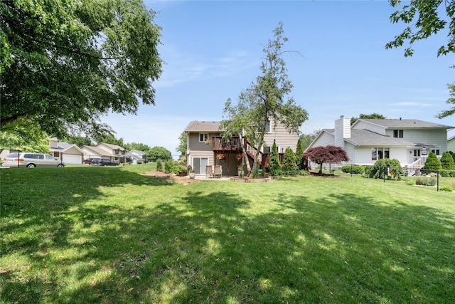 9640 Quail Run, Urbandale, IA 50322 - view of yard featuring stairway and a deck