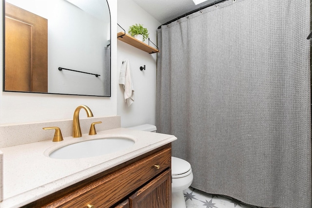 9873 Colby Ave, Clive, IA 50325 - full bath with toilet, vanity, and a shower with curtain