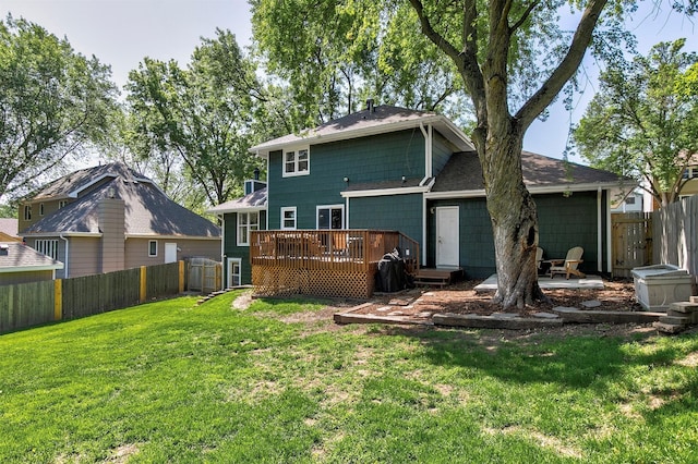 9873 Colby Ave, Clive, IA 50325 - back of property featuring a wooden deck