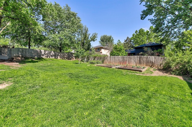 9873 Colby Ave, Clive, IA 50325 - view of yard featuring a garden