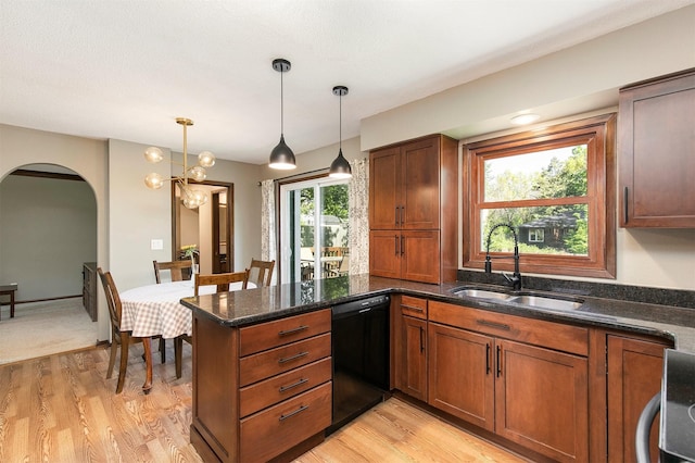 9873 Colby Ave, Clive, IA 50325 - kitchen with black dishwasher, a sink, light wood finished floors, and a peninsula