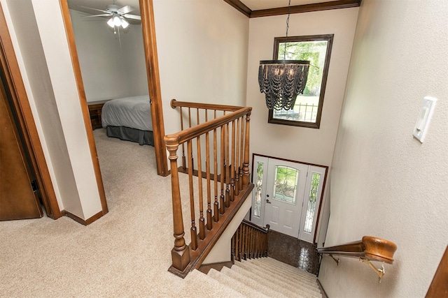 9873 Colby Ave, Clive, IA 50325 - stairs with carpet floors, baseboards, and ceiling fan