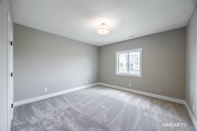 610 Ellis Cir, Adel, IA 50003 - unfurnished room featuring carpet and baseboards