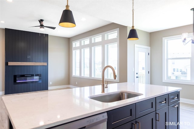 610 Ellis Cir, Adel, IA 50003 - kitchen with a sink, hanging light fixtures, plenty of natural light, and recessed lighting