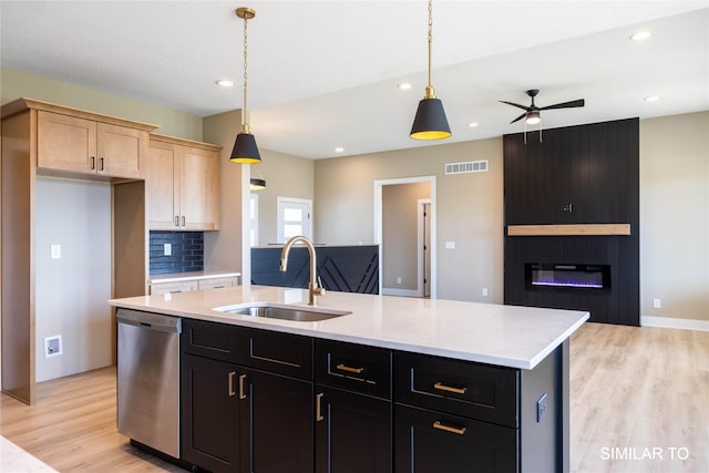 610 Ellis Cir, Adel, IA 50003 - kitchen with a sink, dishwasher, light wood finished floors, recessed lighting, and a ceiling fan