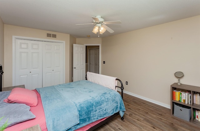 601 Orchard Hills Dr Unit 5011, Norwalk, IA 50211 - bedroom featuring wood finished floors, baseboards, a closet, and ceiling fan