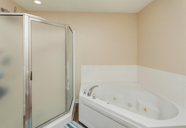 601 Orchard Hills Dr Unit 5011, Norwalk, IA 50211 - bathroom with a stall shower, a whirlpool tub, and recessed lighting