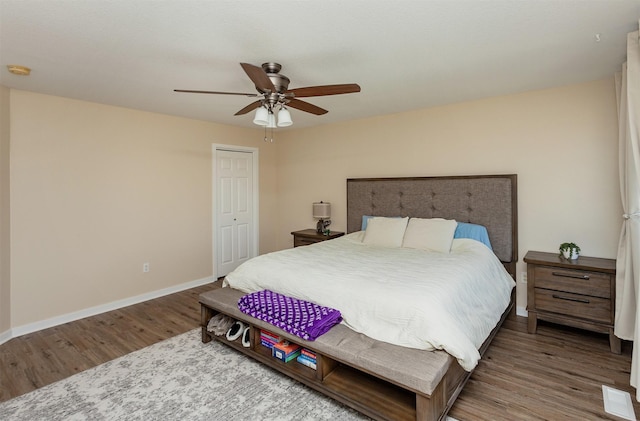 601 Orchard Hills Dr Unit 5011, Norwalk, IA 50211 - bedroom with wood finished floors, baseboards, a ceiling fan, and a closet