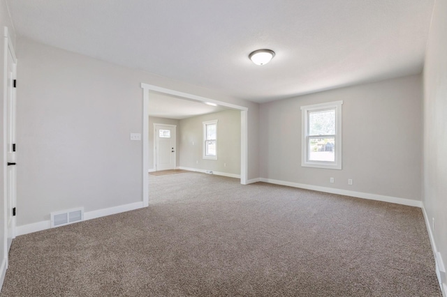 3811 E 30th St, Des Moines, IA 50317 - empty room with carpet and baseboards