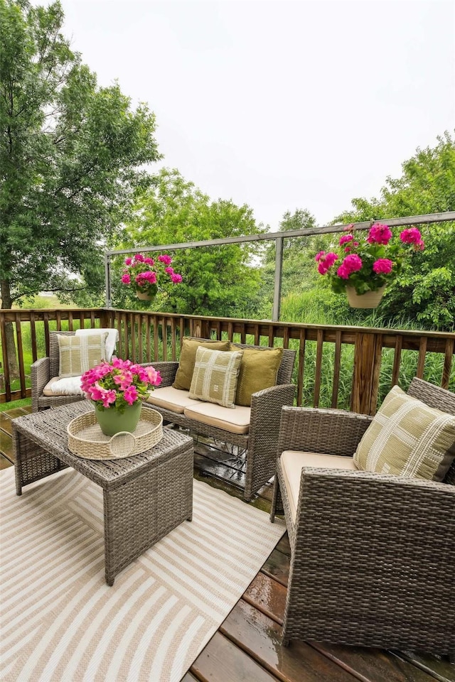 2150 NE 18th St Unit 101, Grimes, IA 50111 - wooden deck featuring an outdoor hangout area