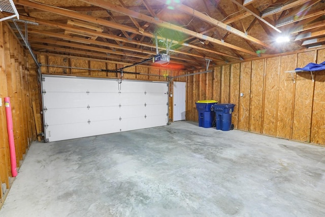 102 Jackson St, Pella, IA 50219 - garage with a garage door opener