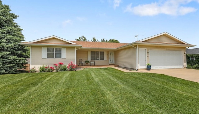 102 Jackson St, Pella, IA 50219 - ranch-style house featuring an attached garage, a porch, driveway, and a front yard