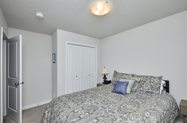 134 Aspen Dr, Norwalk, IA 50211 - carpeted bedroom featuring a closet and baseboards