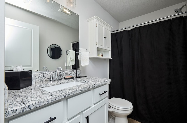 134 Aspen Dr, Norwalk, IA 50211 - bathroom featuring vanity, toilet, a textured ceiling, and curtained shower
