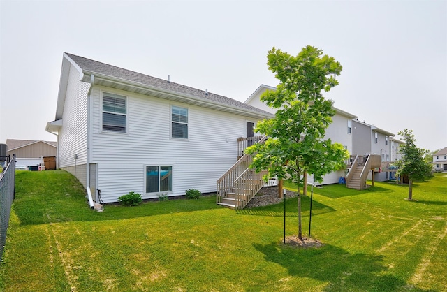 134 Aspen Dr, Norwalk, IA 50211 - back of house with stairs and a deck