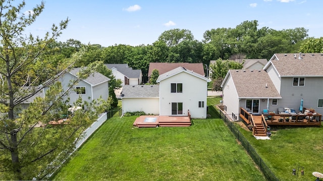 3605 Village Run Dr, Des Moines, IA 50317 - rear view of property featuring a wooden deck and a residential view