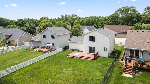 3605 Village Run Dr, Des Moines, IA 50317 - back of house with a wooden deck, a residential view, a garage, and roof with shingles