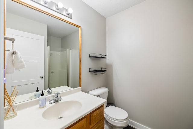 3605 Village Run Dr, Des Moines, IA 50317 - full bathroom with vanity, a shower with door, and toilet