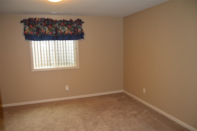 6029 Meacham Dr, Pleasant Hill, IA 50327 - carpeted spare room with baseboards
