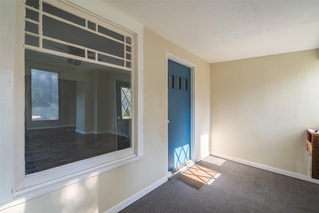 2336 E 13th St, Des Moines, IA 50316 - carpeted spare room with baseboards
