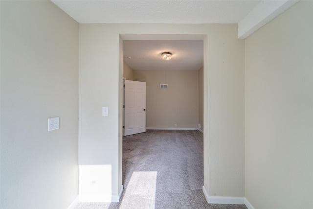 2336 E 13th St, Des Moines, IA 50316 - corridor featuring carpet and baseboards