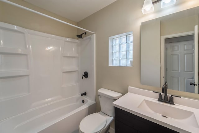 2336 E 13th St, Des Moines, IA 50316 - bathroom featuring toilet, vanity, and shower / bath combination