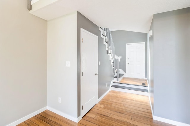 2405 81st Cir, Urbandale, IA 50322 - hall with wood-type flooring and stairway