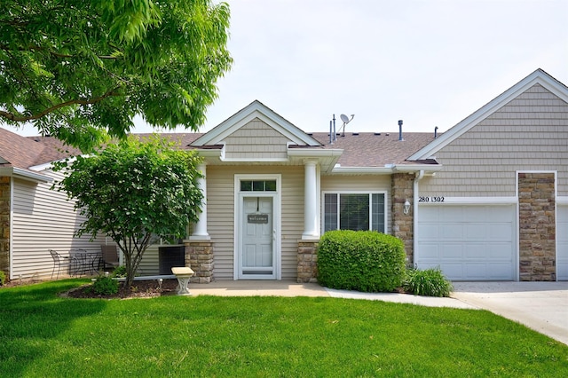 280 S 79th St Unit 1302, West Des Moines, IA 50266 - view of front of home featuring stone siding, a front yard, a garage, and a shingled roof