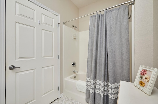 280 S 79th St Unit 1302, West Des Moines, IA 50266 - full bathroom featuring shower / bath combo with shower curtain and tile patterned flooring