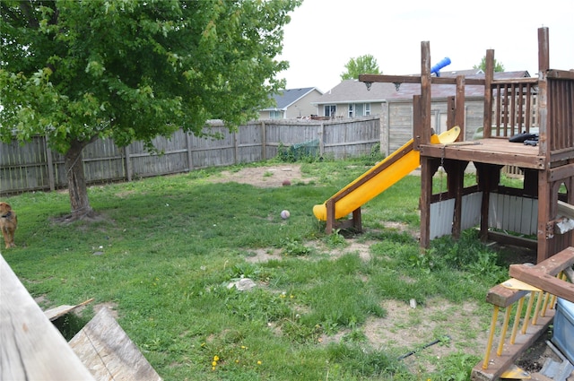104 Walnut Dr NW, Bondurant, IA 50035 - view of yard featuring a deck