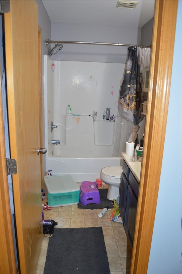 104 Walnut Dr NW, Bondurant, IA 50035 - bathroom with shower / bathtub combination with curtain, vanity, toilet, and tile patterned floors