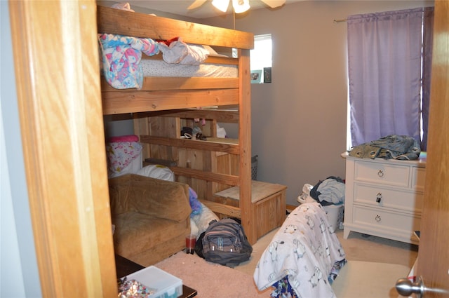 104 Walnut Dr NW, Bondurant, IA 50035 - bedroom featuring carpet and a ceiling fan