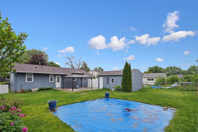 2901 E 40th Ct, Des Moines, IA 50317 - back of house featuring a gazebo and a patio