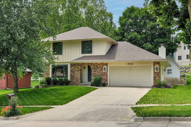 3510 Wolcott Ave, Des Moines, IA 50321 - view of front facade featuring an attached garage, brick siding, concrete driveway, roof with shingles, and a chimney