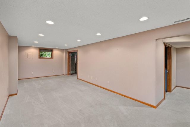 3510 Wolcott Ave, Des Moines, IA 50321 - basement featuring recessed lighting, carpet floors, and baseboards