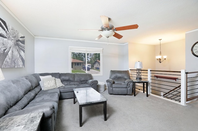 3811 SW 3rd St, Des Moines, IA 50315 - carpeted living area featuring a chandelier, a ceiling fan, and crown molding