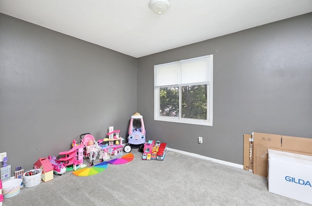 3811 SW 3rd St, Des Moines, IA 50315 - playroom with carpet and baseboards