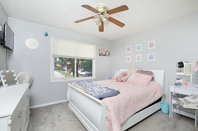 3811 SW 3rd St, Des Moines, IA 50315 - bedroom with light carpet, ceiling fan, and baseboards