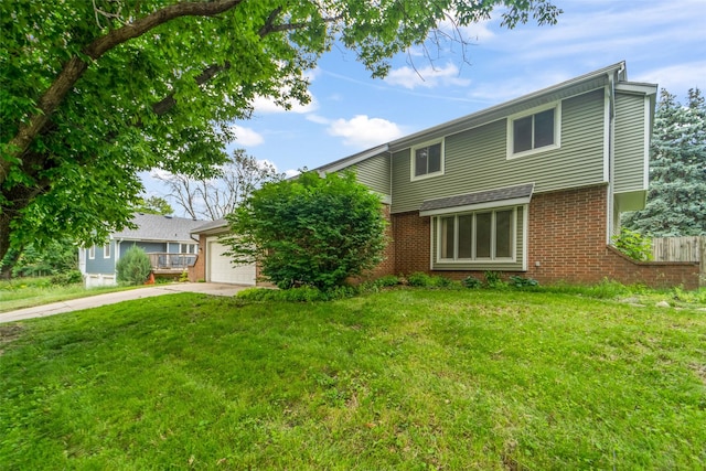 1495 Rio Valley Dr, Clive, IA 50325 - view of front facade with brick siding, concrete driveway, and a garage
