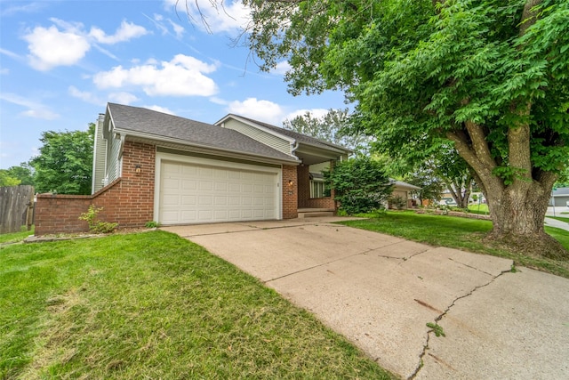 1495 Rio Valley Dr, Clive, IA 50325 - view of front of house featuring brick siding, a garage, concrete driveway, a chimney, and roof with shingles
