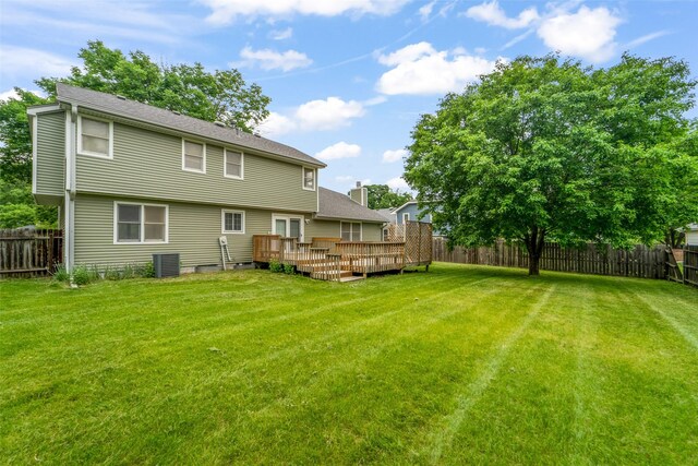 1495 Rio Valley Dr, Clive, IA 50325 - rear view of property featuring a wooden deck and central AC
