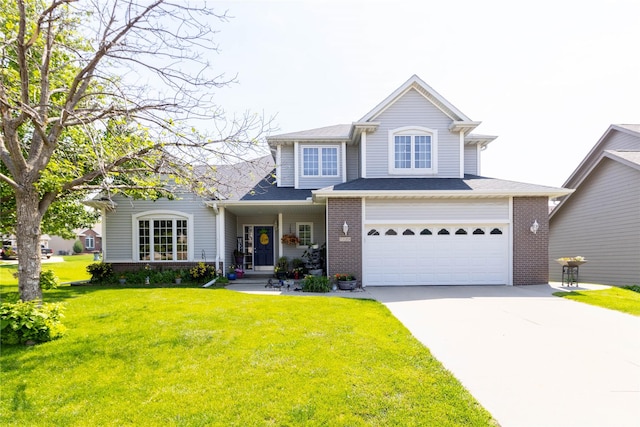 7129 Ridgedale Ct, Johnston, IA 50131 - traditional-style home featuring brick siding, a garage, concrete driveway, and a front lawn