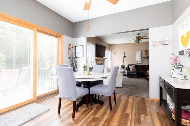 7129 Ridgedale Ct, Johnston, IA 50131 - dining area with a ceiling fan and wood finished floors