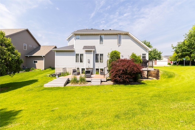 7129 Ridgedale Ct, Johnston, IA 50131 - rear view of house featuring a lawn and a wooden deck