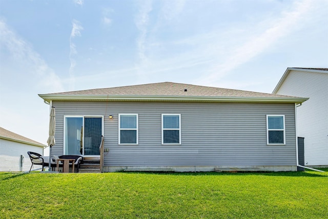 6828 NW 106th St, Johnston, IA 50131 - back of house with entry steps and a lawn