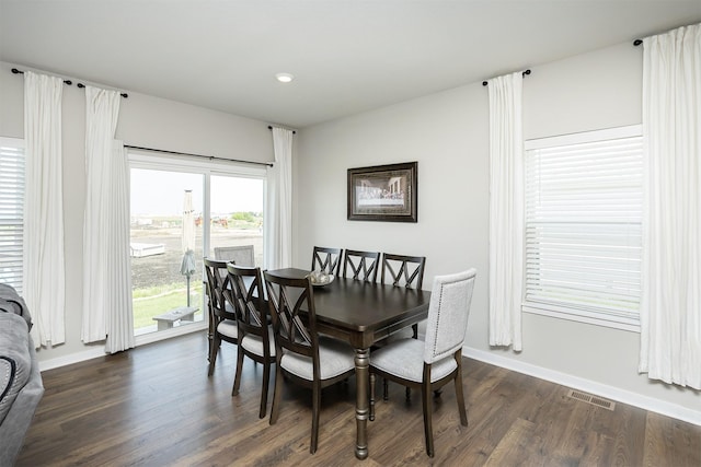 6828 NW 106th St, Johnston, IA 50131 - dining area with dark wood-style flooring, baseboards, and recessed lighting