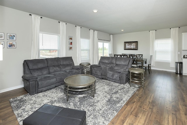 6828 NW 106th St, Johnston, IA 50131 - living room featuring dark wood-style flooring, baseboards, and recessed lighting