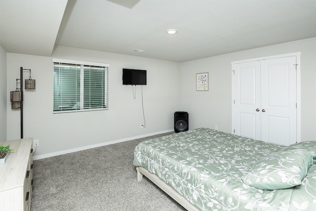 6828 NW 106th St, Johnston, IA 50131 - bedroom featuring carpet, baseboards, and a closet