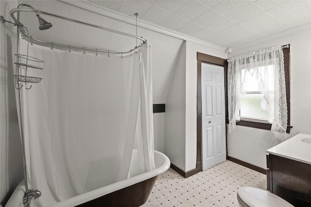 428 Crawford St, Boone, IA 50036 - full bath with tile patterned floors, vanity, baseboards, shower / tub combo with curtain, and crown molding
